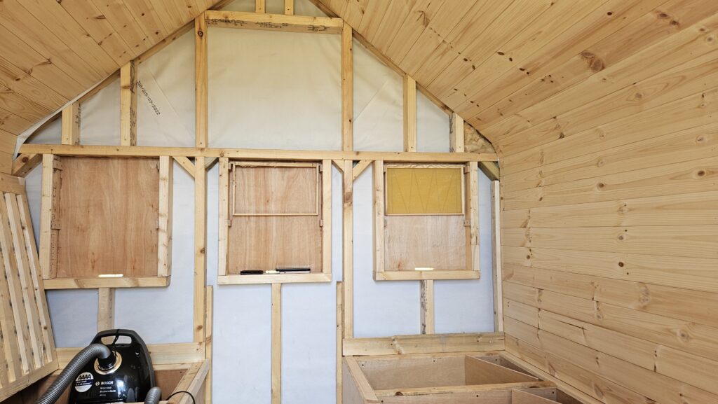 Building a bee bed cabin with observation hives as part of The Bee Beds Academy training course